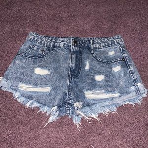 Blue distressed denim shorts